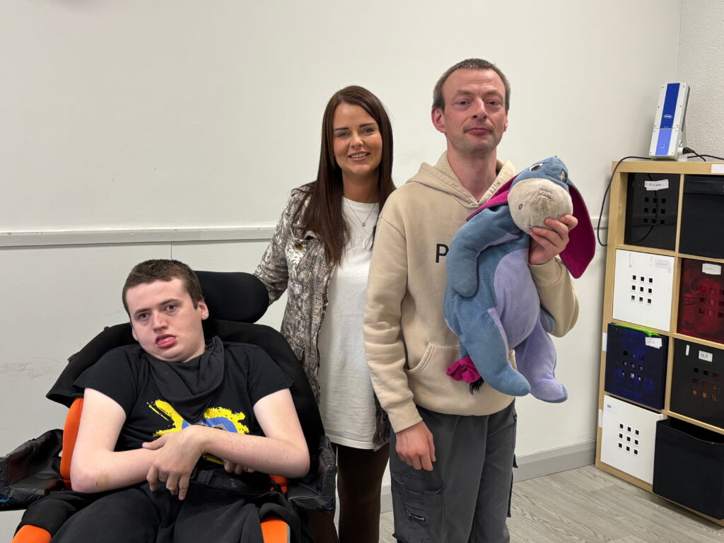 George, Angela and Albert from Caritas Care's FX Service